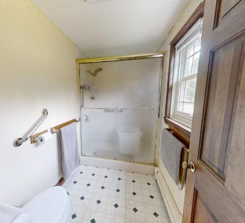 116 Point Rd, Acton, ME 04001 - bathroom with a stall shower and a baseboard radiator