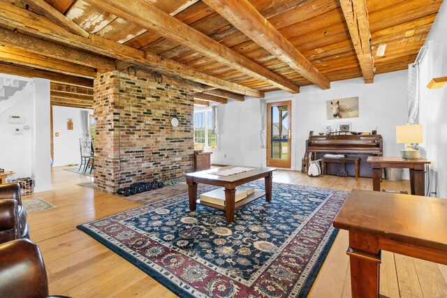18 Fox Meade Ln, Searsmont, ME 04973 - living room with wood ceiling with exposed beams and wood-type flooring