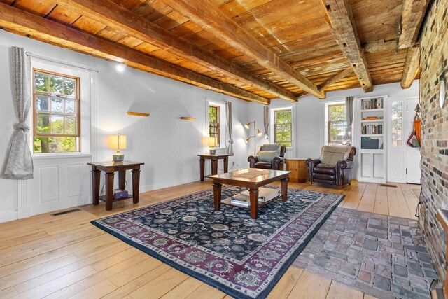 18 Fox Meade Ln, Searsmont, ME 04973 - sitting room featuring wooden ceiling with exposed beams and wood-type flooring