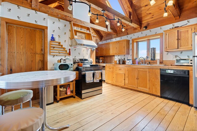 18 Fox Meade Ln, Searsmont, ME 04973 - kitchen with black dishwasher, stainless steel range with electric cooktop, extractor fan, light countertops, and high vaulted ceiling