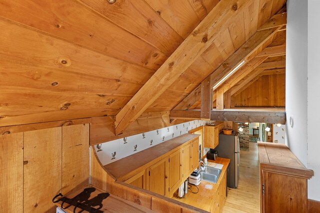 18 Fox Meade Ln, Searsmont, ME 04973 - bonus room with vaulted ceiling, light wood-type flooring, wood ceiling, and a sink