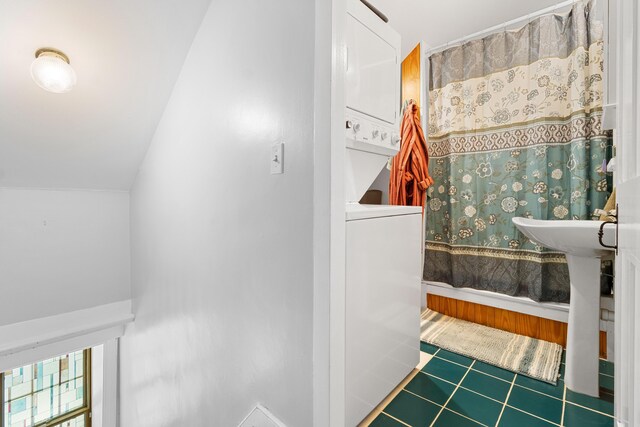 18 Fox Meade Ln, Searsmont, ME 04973 - full bathroom featuring tile patterned floors, lofted ceiling, and a shower with curtain