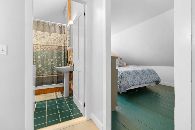 18 Fox Meade Ln, Searsmont, ME 04973 - bedroom with baseboards, wood finished floors, and a sink