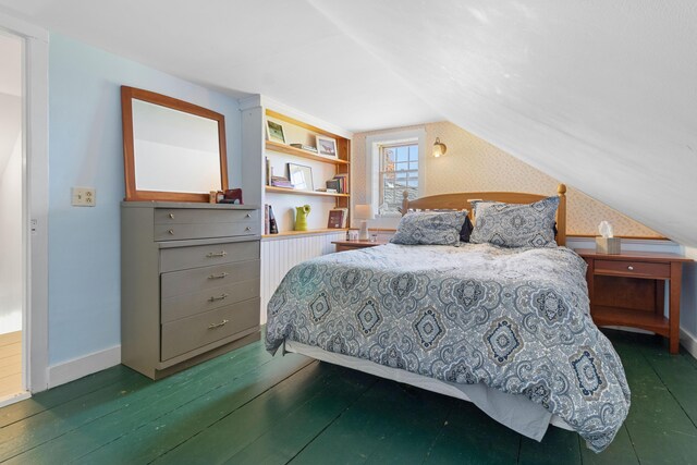 18 Fox Meade Ln, Searsmont, ME 04973 - bedroom featuring wallpapered walls, vaulted ceiling, baseboards, and wood-type flooring