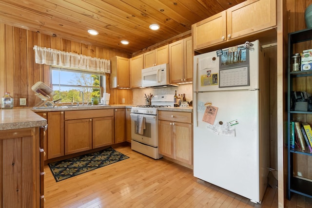 18 Fox Meade Ln, Searsmont, ME 04973 - kitchen with white appliances, light wood-style floors, wooden ceiling, recessed lighting, and backsplash