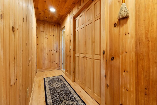 18 Fox Meade Ln, Searsmont, ME 04973 - doorway to outside with light wood-style floors, wood ceiling, wooden walls, and recessed lighting