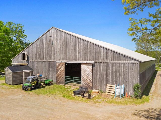 18 Fox Meade Ln, Searsmont, ME 04973 - view of barn featuring dirt driveway