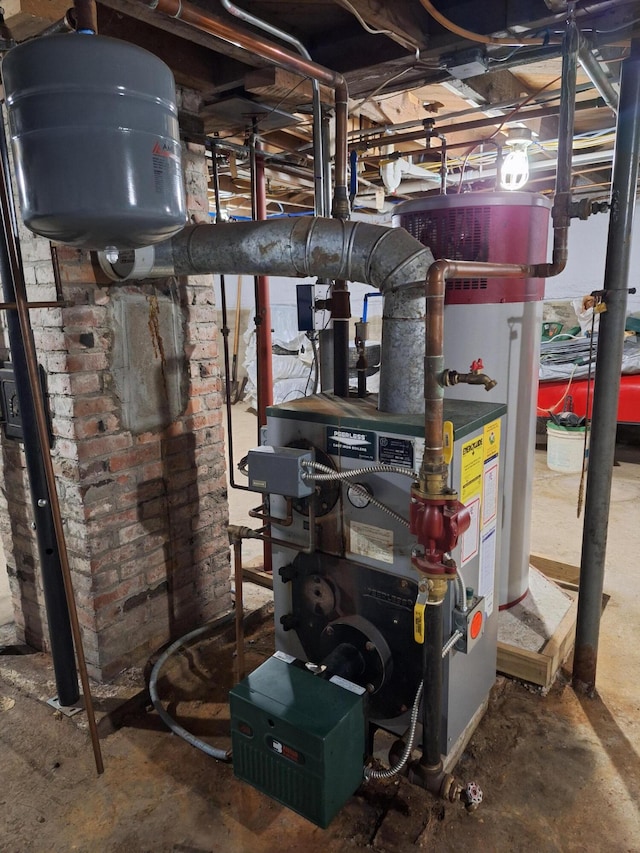 433 Hudson Rd, Corinth, ME 04427 - utilities with gas water heater and a heating unit