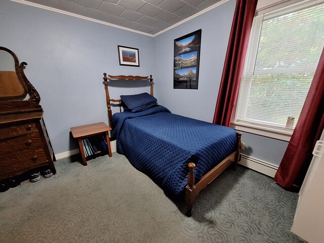 433 Hudson Rd, Corinth, ME 04427 - carpeted bedroom featuring a baseboard radiator, crown molding, multiple windows, and baseboards