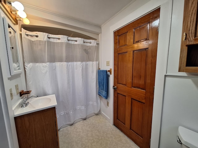 433 Hudson Rd, Corinth, ME 04427 - full bathroom featuring vanity, toilet, a shower with shower curtain, and ornamental molding