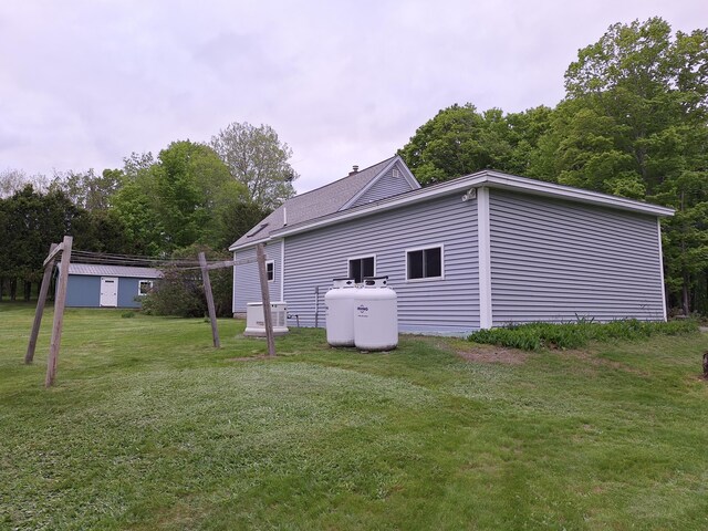 433 Hudson Rd, Corinth, ME 04427 - view of property exterior with a yard and a chimney