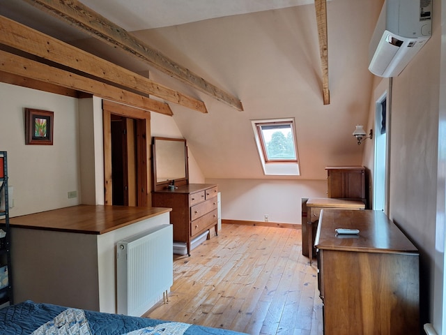433 Hudson Rd, Corinth, ME 04427 - bedroom with a skylight, radiator, light wood-type flooring, a wall mounted AC, and baseboards