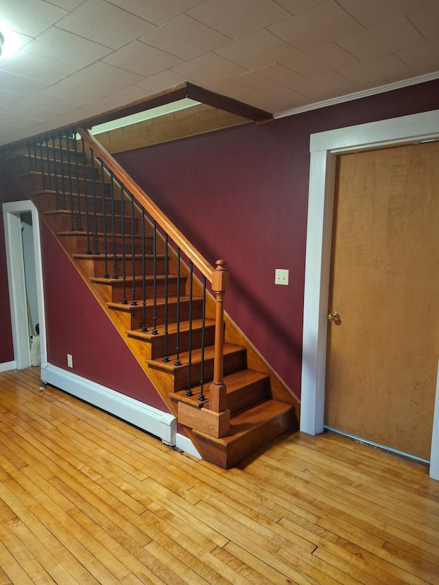433 Hudson Rd, Corinth, ME 04427 - staircase with wood-type flooring and baseboards