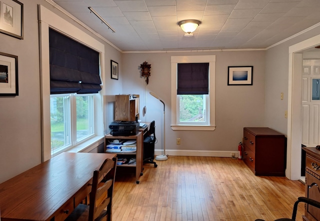 433 Hudson Rd, Corinth, ME 04427 - home office featuring crown molding, light wood-style flooring, and baseboards
