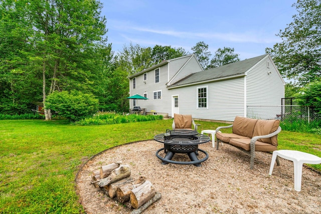 578 Little River Rd, Lebanon, ME 04027 - back of house with an outdoor fire pit