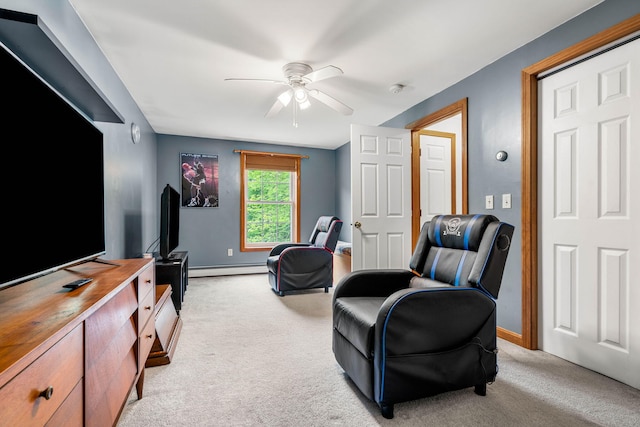 578 Little River Rd, Lebanon, ME 04027 - living area featuring ceiling fan, light carpet, and baseboard heating