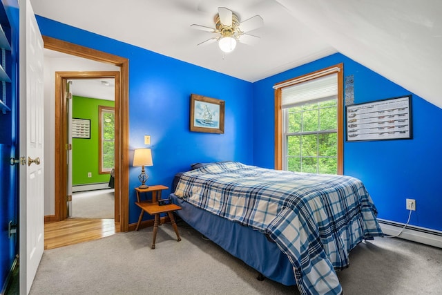 578 Little River Rd, Lebanon, ME 04027 - carpeted bedroom featuring a baseboard radiator, lofted ceiling, a ceiling fan, and baseboard heating