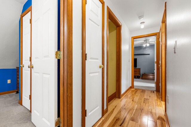 578 Little River Rd, Lebanon, ME 04027 - hallway with baseboards and light wood-style floors