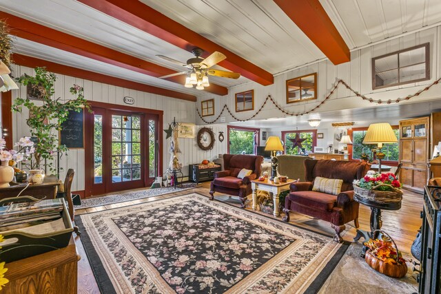 9 Dry Point Dr, Rome, ME 04963 - living area featuring beam ceiling, ceiling fan, wood finished floors, and ornamental molding