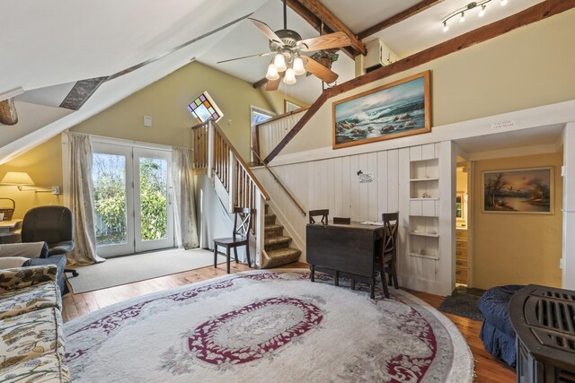 9 Dry Point Dr, Rome, ME 04963 - living room with a ceiling fan, wood finished floors, stairs, and high vaulted ceiling