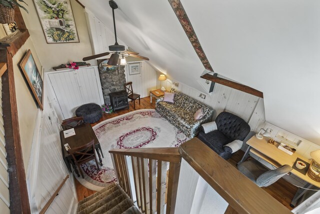 9 Dry Point Dr, Rome, ME 04963 - living area with wood finished floors, a ceiling fan, vaulted ceiling, and wood walls