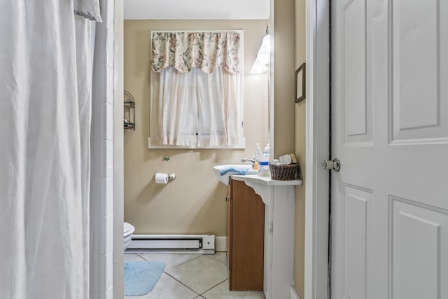 9 Dry Point Dr, Rome, ME 04963 - full bath featuring baseboard heating, vanity, toilet, tile patterned floors, and a shower with curtain