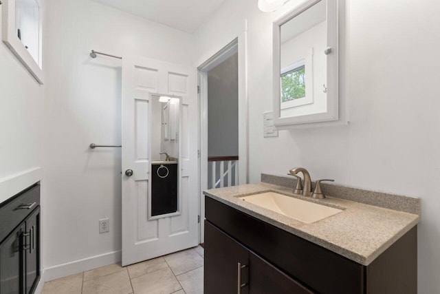 20 Cobble Hill Rd, New Gloucester, ME 04260 - bathroom featuring vanity, baseboards, and tile patterned floors