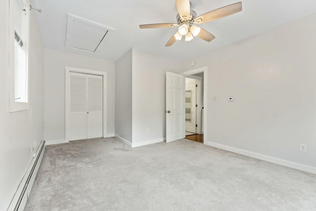 20 Cobble Hill Rd, New Gloucester, ME 04260 - unfurnished bedroom with a baseboard heating unit, light colored carpet, a closet, and baseboards