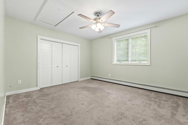 20 Cobble Hill Rd, New Gloucester, ME 04260 - unfurnished bedroom with carpet floors, a baseboard radiator, a closet, a ceiling fan, and baseboards