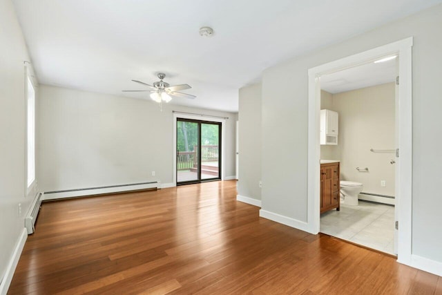 20 Cobble Hill Rd, New Gloucester, ME 04260 - empty room with baseboard heating, ceiling fan, and wood finished floors