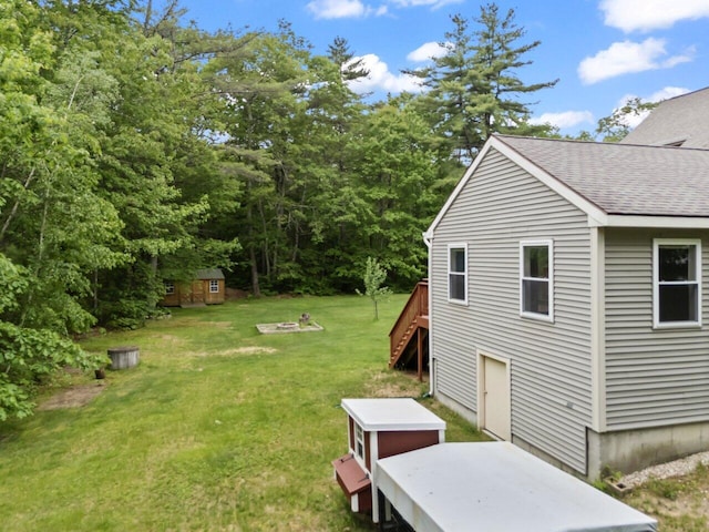 20 Cobble Hill Rd, New Gloucester, ME 04260 - view of green lawn featuring stairway and an outbuilding