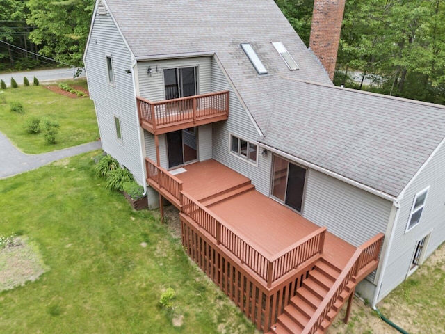 20 Cobble Hill Rd, New Gloucester, ME 04260 - back of house with a chimney, roof with shingles, a lawn, a deck, and stairs