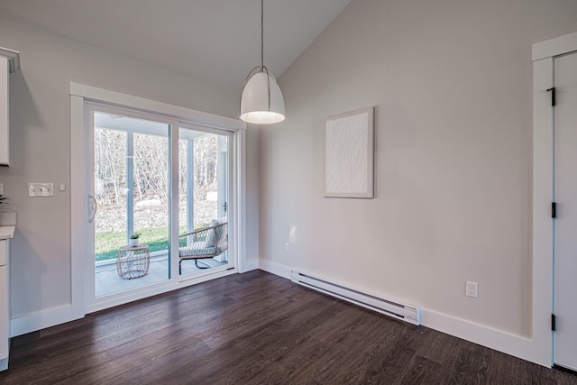 19 Efficiency Way, Bridgton, ME 04009 - unfurnished dining area featuring a baseboard heating unit, dark wood finished floors, lofted ceiling, and baseboards