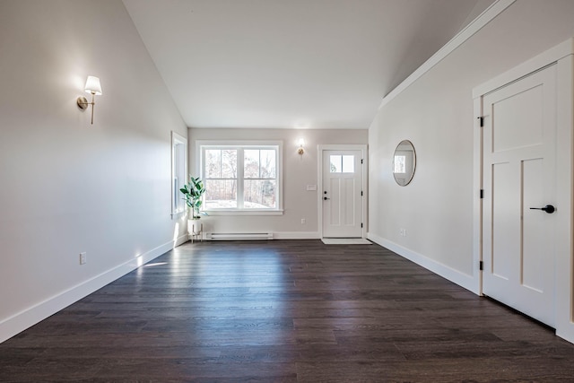 19 Efficiency Way, Bridgton, ME 04009 - entrance foyer with a baseboard radiator, vaulted ceiling, baseboards, and dark wood-style floors
