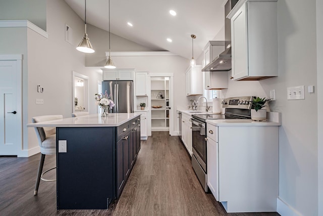19 Efficiency Way, Bridgton, ME 04009 - kitchen with appliances with stainless steel finishes, dark wood-style floors, a center island, light countertops, and a sink