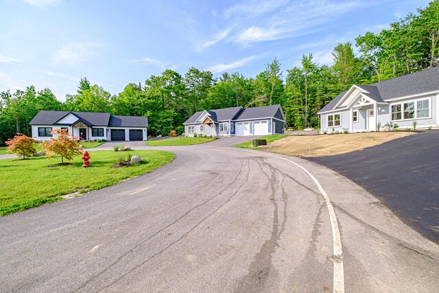 19 Efficiency Way, Bridgton, ME 04009 - view of asphalt road featuring view of scattered trees