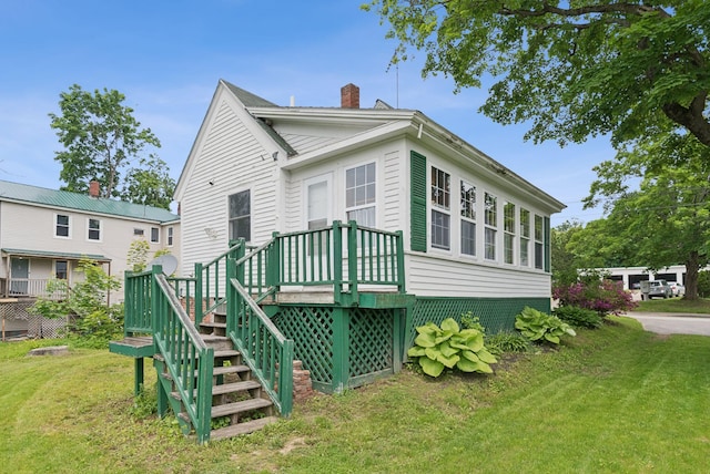 20 Green St, Winthrop, ME 04364 - back of property featuring a yard and a chimney