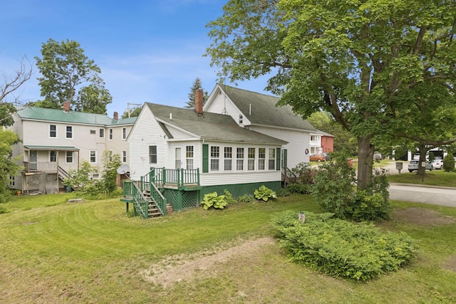 20 Green St, Winthrop, ME 04364 - rear view of property with stairway, a lawn, a deck, and a shingled roof