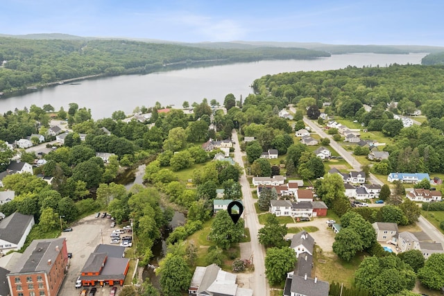 20 Green St, Winthrop, ME 04364 - aerial perspective of suburban area with a nearby body of water and a heavily wooded area