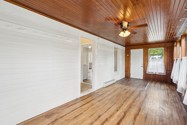 20 Green St, Winthrop, ME 04364 - unfurnished sunroom featuring a baseboard heating unit