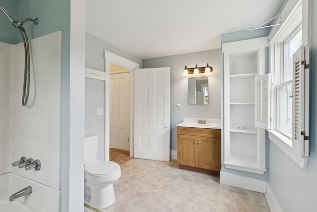 20 Green St, Winthrop, ME 04364 - bathroom featuring healthy amount of natural light, vanity, baseboards, and toilet