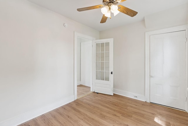 20 Green St, Winthrop, ME 04364 - unfurnished bedroom with light wood-type flooring, baseboards, and ceiling fan