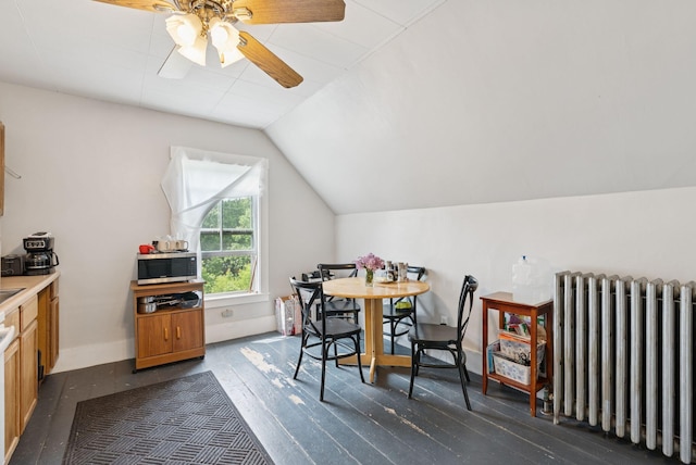 20 Green St, Winthrop, ME 04364 - dining room featuring radiator, ceiling fan, lofted ceiling, and dark wood-type flooring