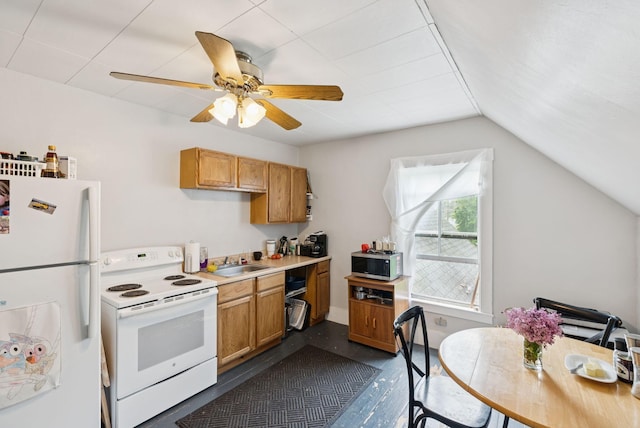20 Green St, Winthrop, ME 04364 - kitchen featuring white appliances, a sink, lofted ceiling, ceiling fan, and light countertops