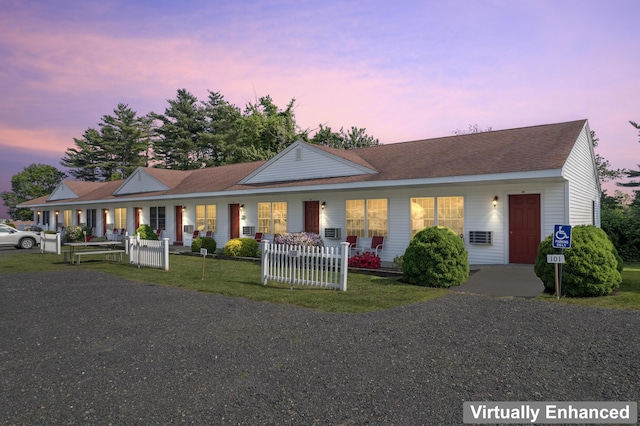 1139 Post Rd Unit 102, Wells, ME 04090 - ranch-style home with a porch, a yard, and a shingled roof