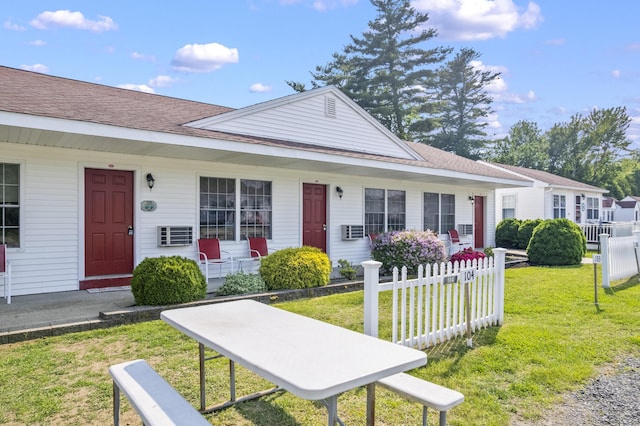 1139 Post Rd Unit 102, Wells, ME 04090 - view of front of home with a shingled roof