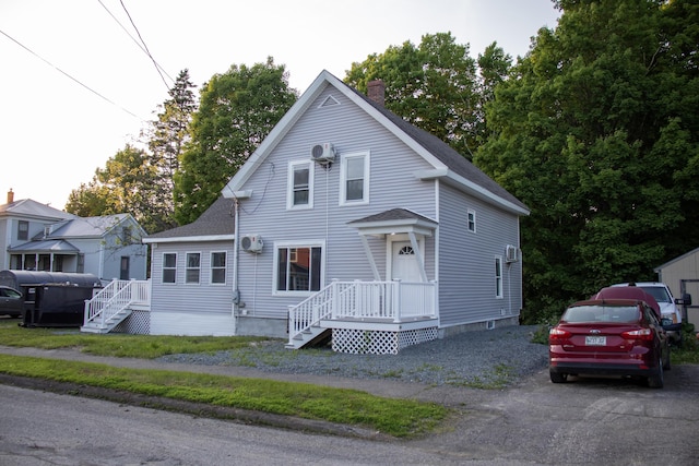 2 Watson Ave, Houlton, ME 04730 - view of front facade with roof with shingles and a chimney