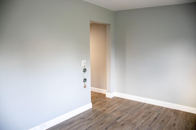 2 Watson Ave, Houlton, ME 04730 - unfurnished room with wood finished floors and baseboards