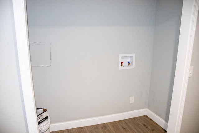 2 Watson Ave, Houlton, ME 04730 - laundry area with hookup for a washing machine, wood finished floors, and baseboards