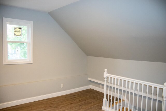 2 Watson Ave, Houlton, ME 04730 - bonus room with baseboards, dark wood-type flooring, and lofted ceiling